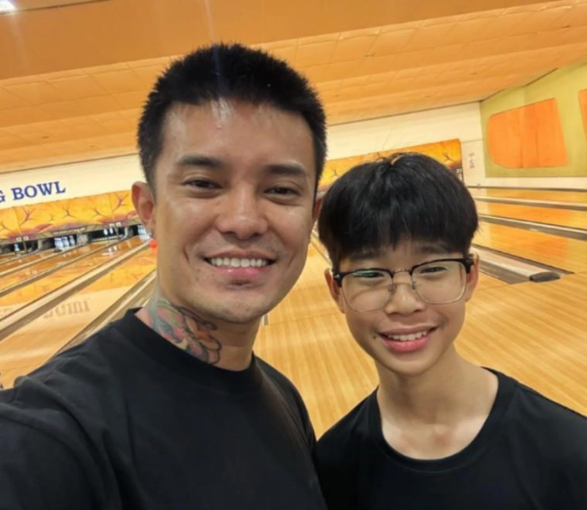 Simon Khung with his son.