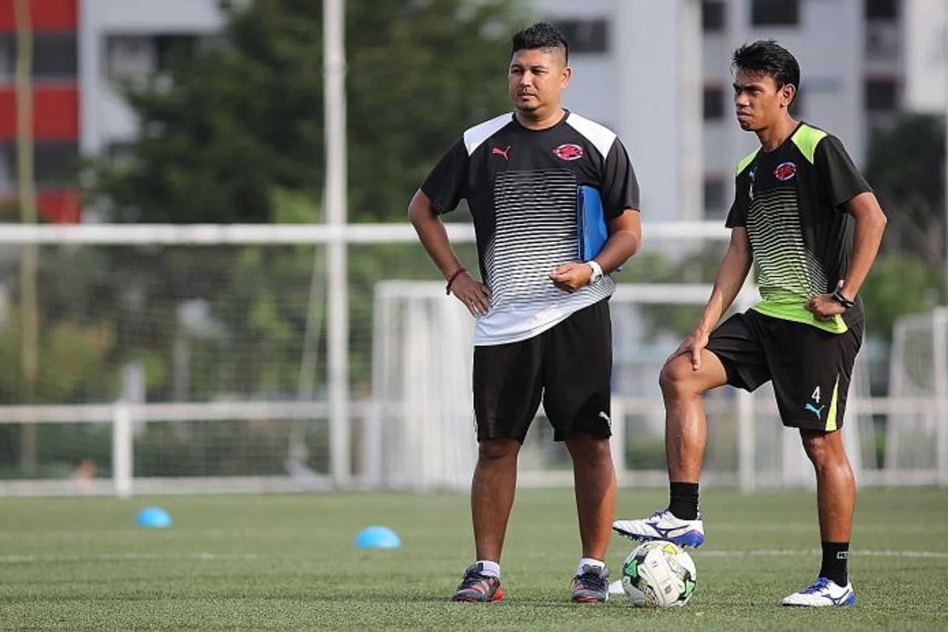 LOOKING FORWARD: Home United coach Aidil Sharin (left) and captain Juma'at Jantan (right) are not about to let slip the chance of playing in the AFC Cup.