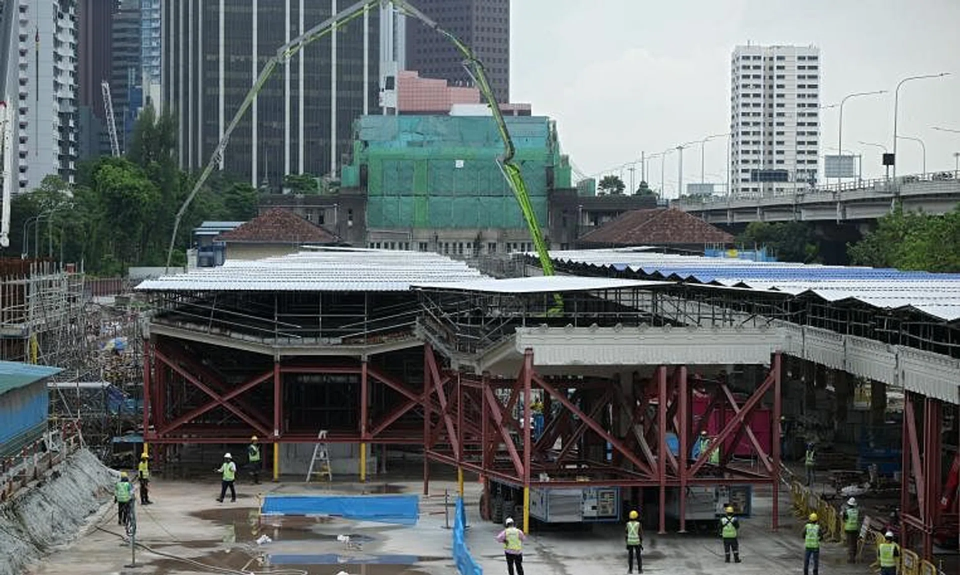 The platform canopy at the former Tanjong Pagar Railway Station was previously cut up and moved to a nearby site for storage, to make way for works for the Circle Line extension.