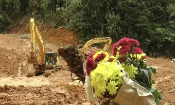 Malaysia landslide: Firefighters declined to have blood pressure taken so they could continue with search