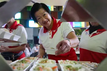 Students cook buffet meal for Temasek Poly's cleaners