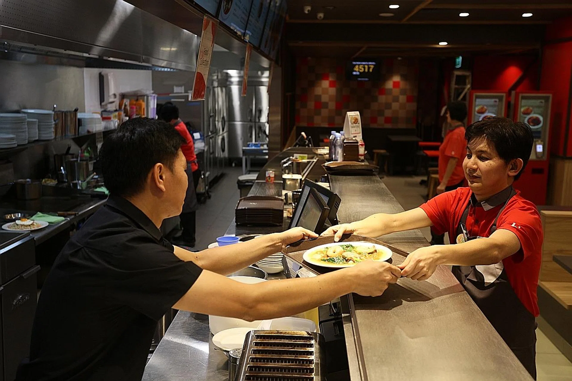 The Han's cafe chain has been hiring people with special needs since 2007. They make up 10 per cent of the company's workers. 