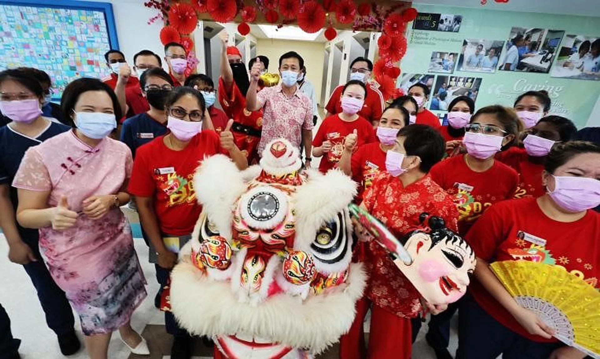Health Minister Ong Ye Kung (centre) visiting patients and staff of Tan Tock Seng Hospital on the first day of the Chinese New Year, on Feb 10.
