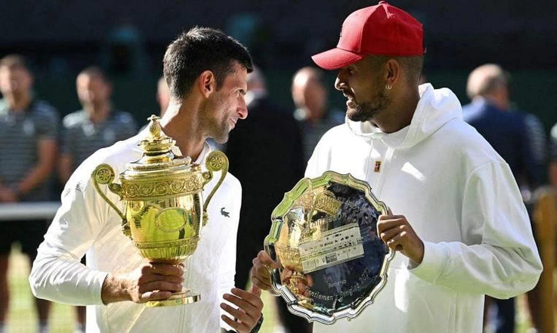 Serbia's Novak Djokovic (left) with Australia's Nick Kyrgios after beating him in the Wimbledon final in July 2022. 