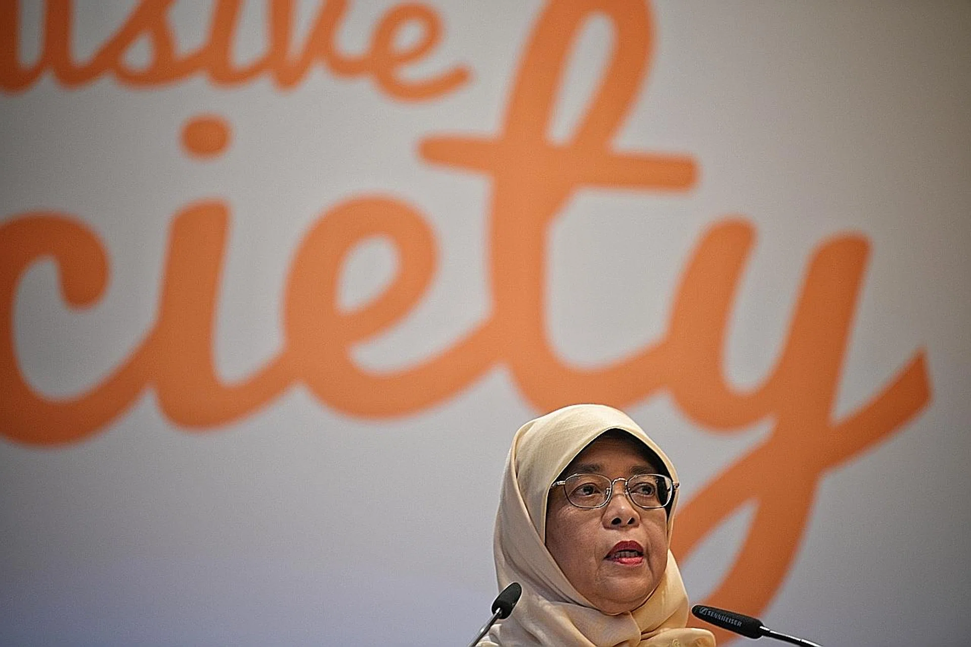 (Above) President Halimah Yacob speaking at the 9th International Together Against Stigma Conference.