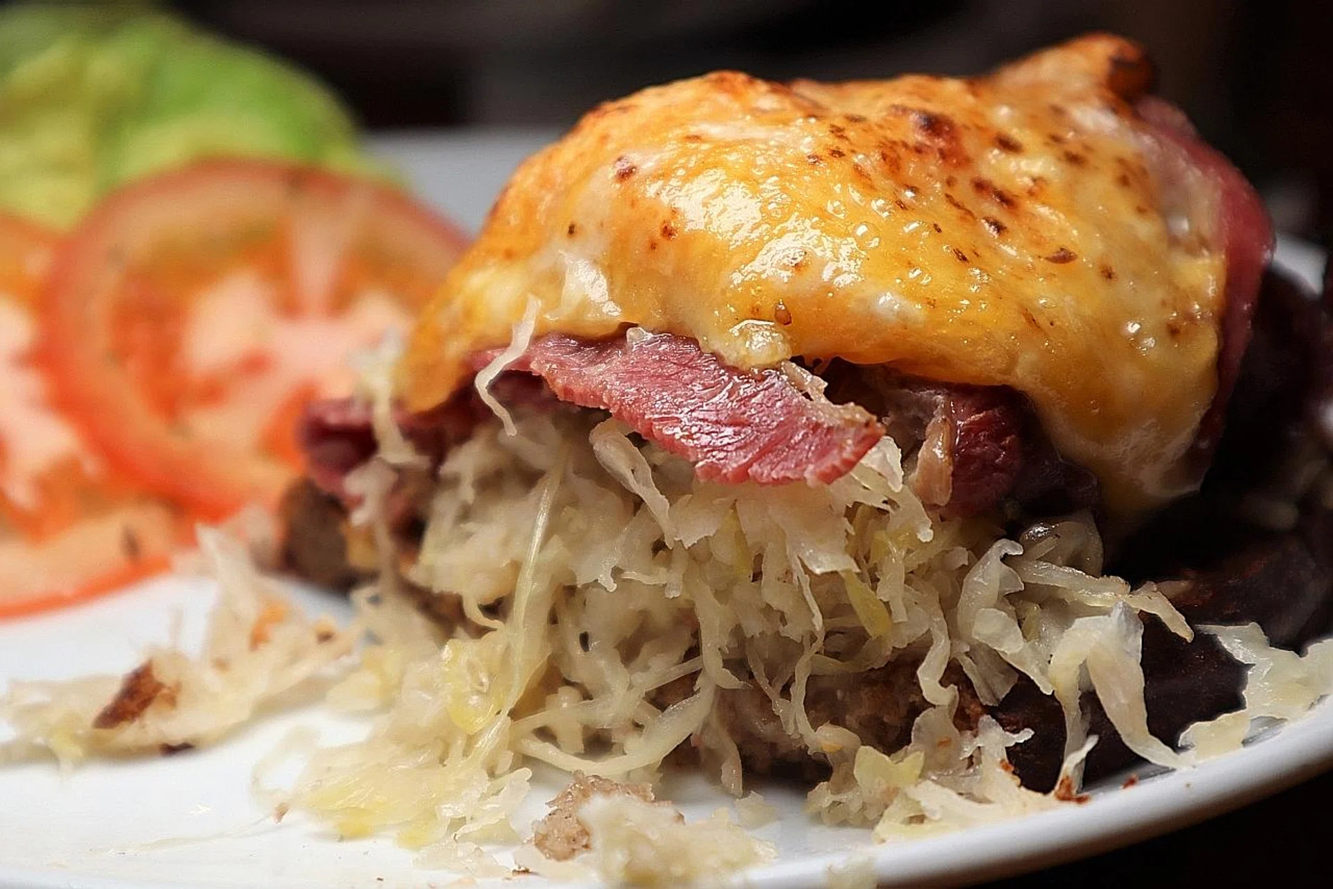 (Above) The signature Reuben Sandwich, opened and exposed; the Steeple's Burger with an oozy egg atop; Mr David Mun. 