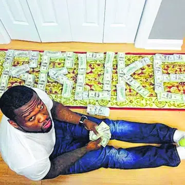 'Broke' 50 Cent bares cash, back in court