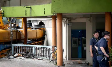 43-tonne mobile crane crashes into POSB branch