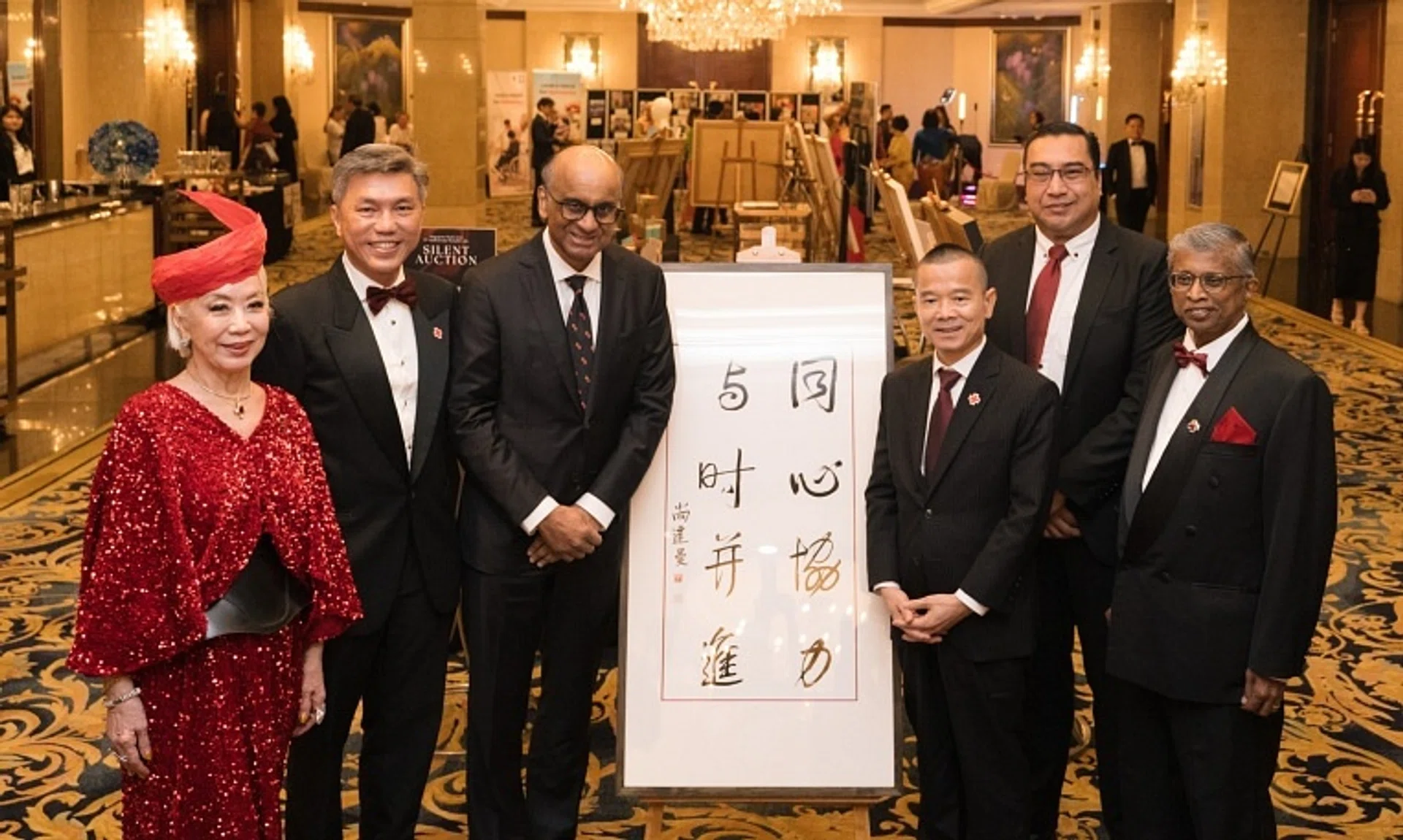 President Tharman Shanmugaratnam (third from left) with SRC 75th Anniversary Benefit Gala committee chairwoman Genevieve Peggy Jeffs, SRC chairman Tan Kai Hoe, Mr Fang Angzhen, Mr Pearce Cheng and SRC chief executive Benjamin William.