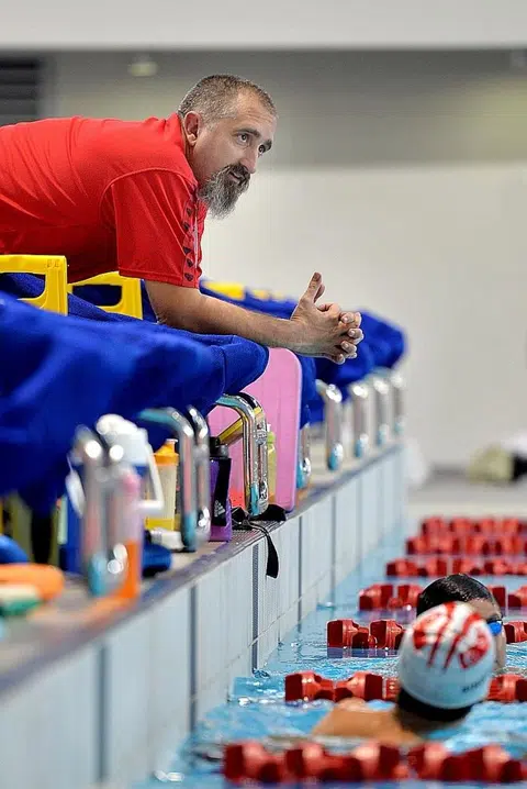 Auburn University celebrate capture of Singapore swim coach Lopez