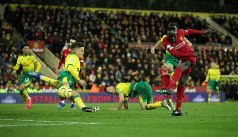 Mane cracks Norwich's resistance as Liverpool go 25 points clear