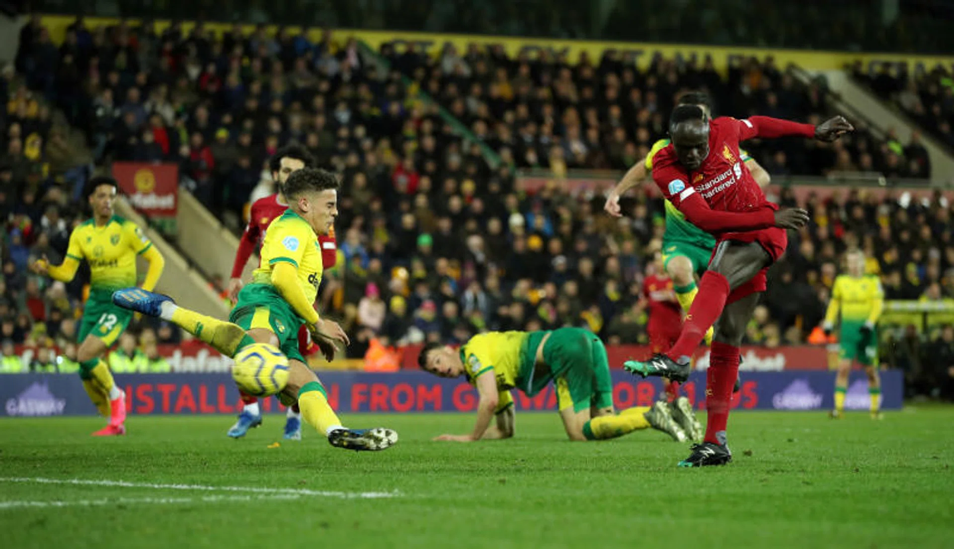 Sadio Mane scoring the only goal of the game against Norwich City, following a flighted pass by Jordan Henderson.