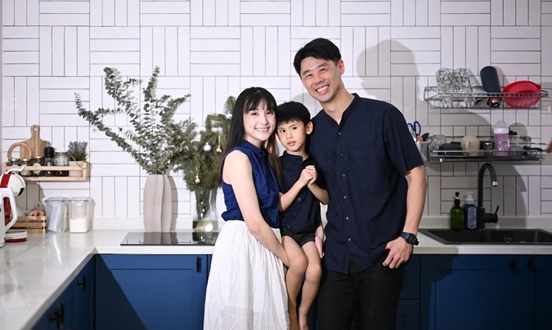 Four-year-old Elliot Koh, who was diagnosed with Leber congenital amaurosis, with his parents Eric Koh and Koh Wei Shi. Elliot is being seen at the Ocular Genetics Service.