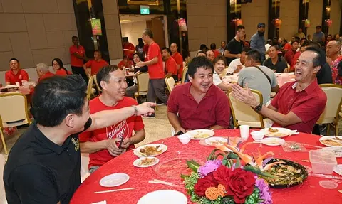 Migrant workers get emotional surprise at Chinese New Year dinner