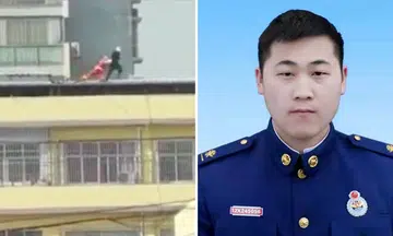 Firefighter dies while trying to save woman from jumping off building in China