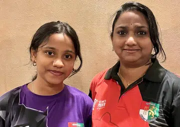 Mother and daughter bat for Singapore