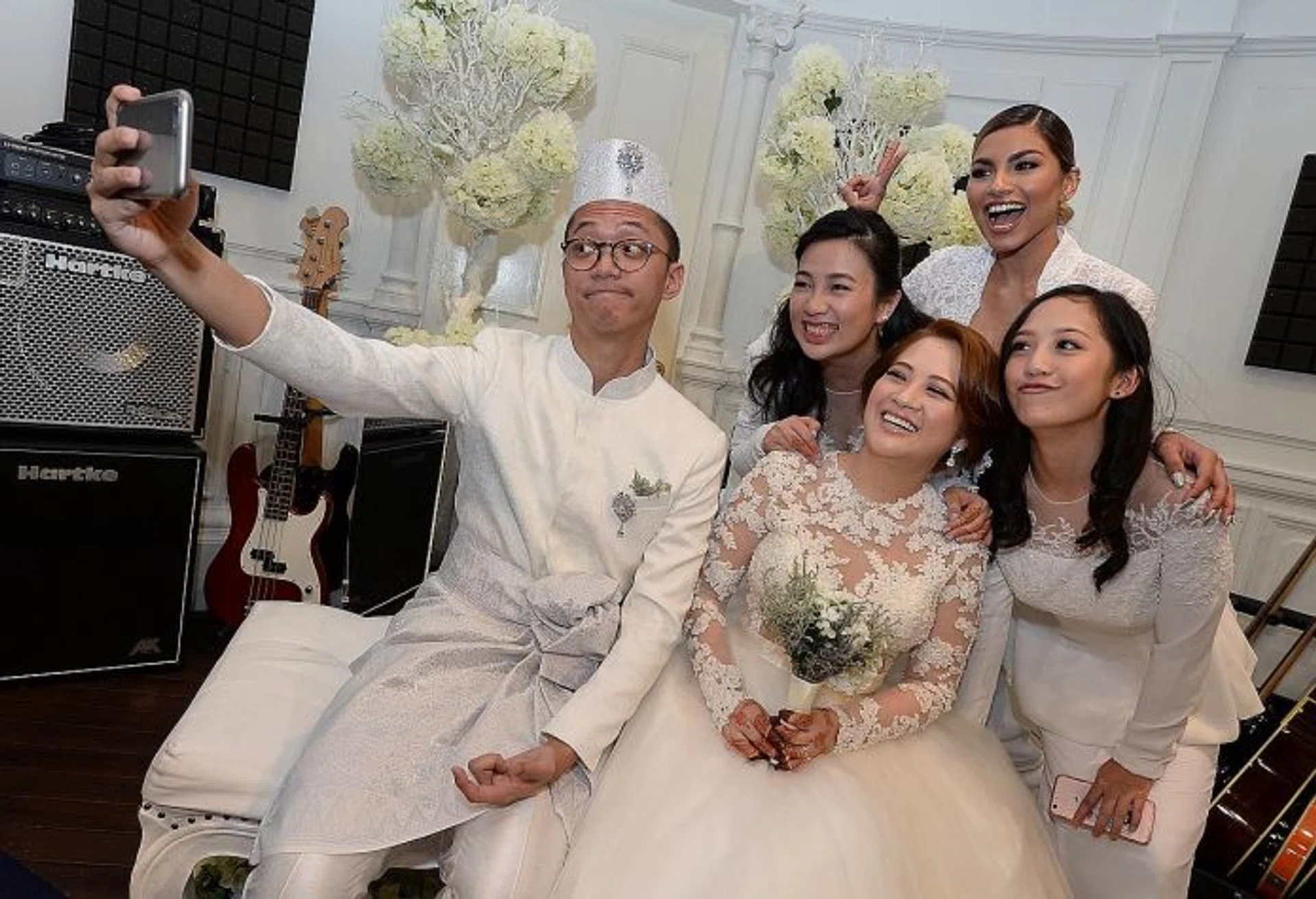SELFIE: Singapore Idol Sezairi and his bride Syaza Qistina Tan with (from right) his sister-in-law Hannah, and good friends Tabitha Nauser and Joanne Chong.