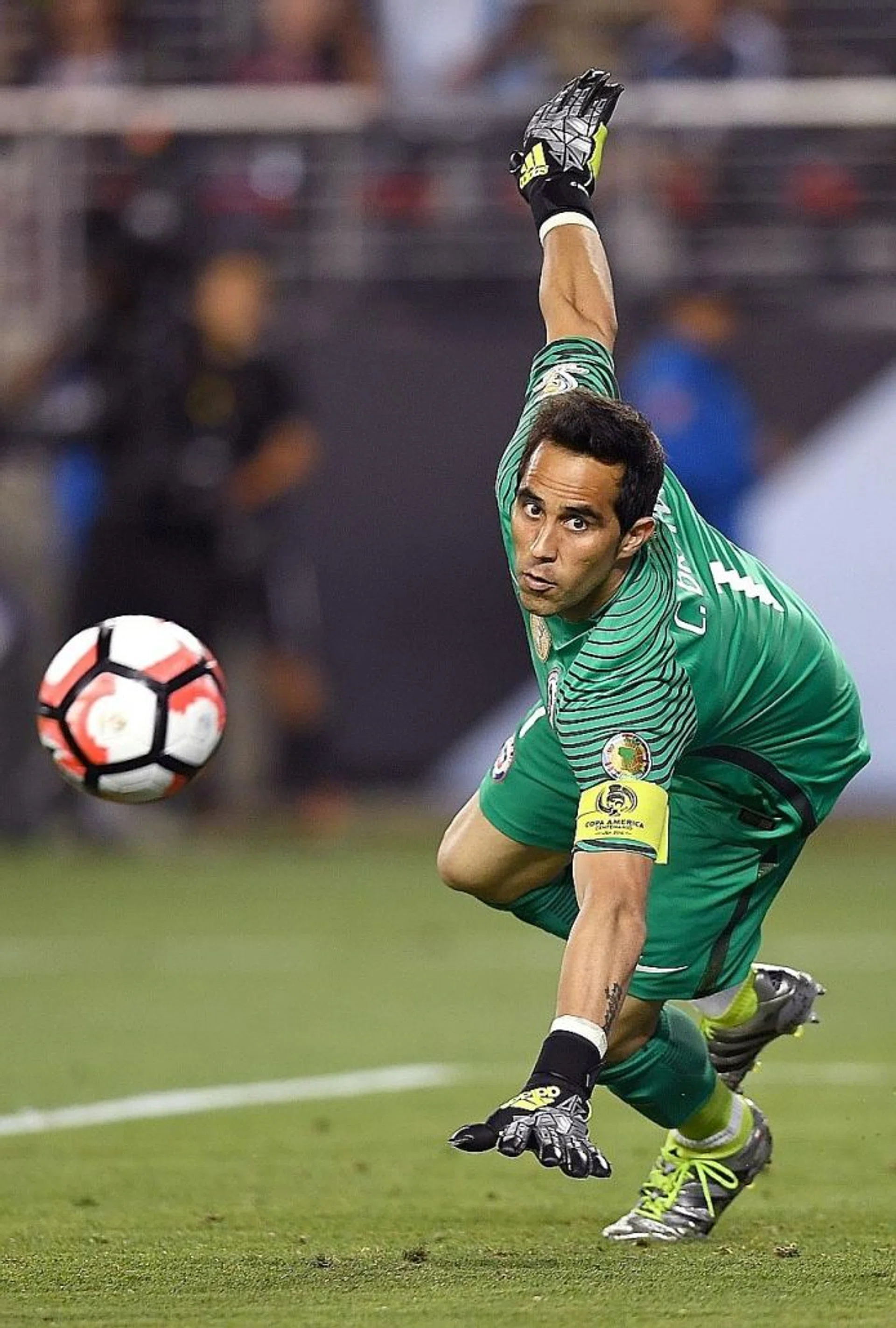 ALMOST DONE: A move to Man City could be imminent, after Claudio Bravo was pictured at the airport in Barcelona yesterday.
