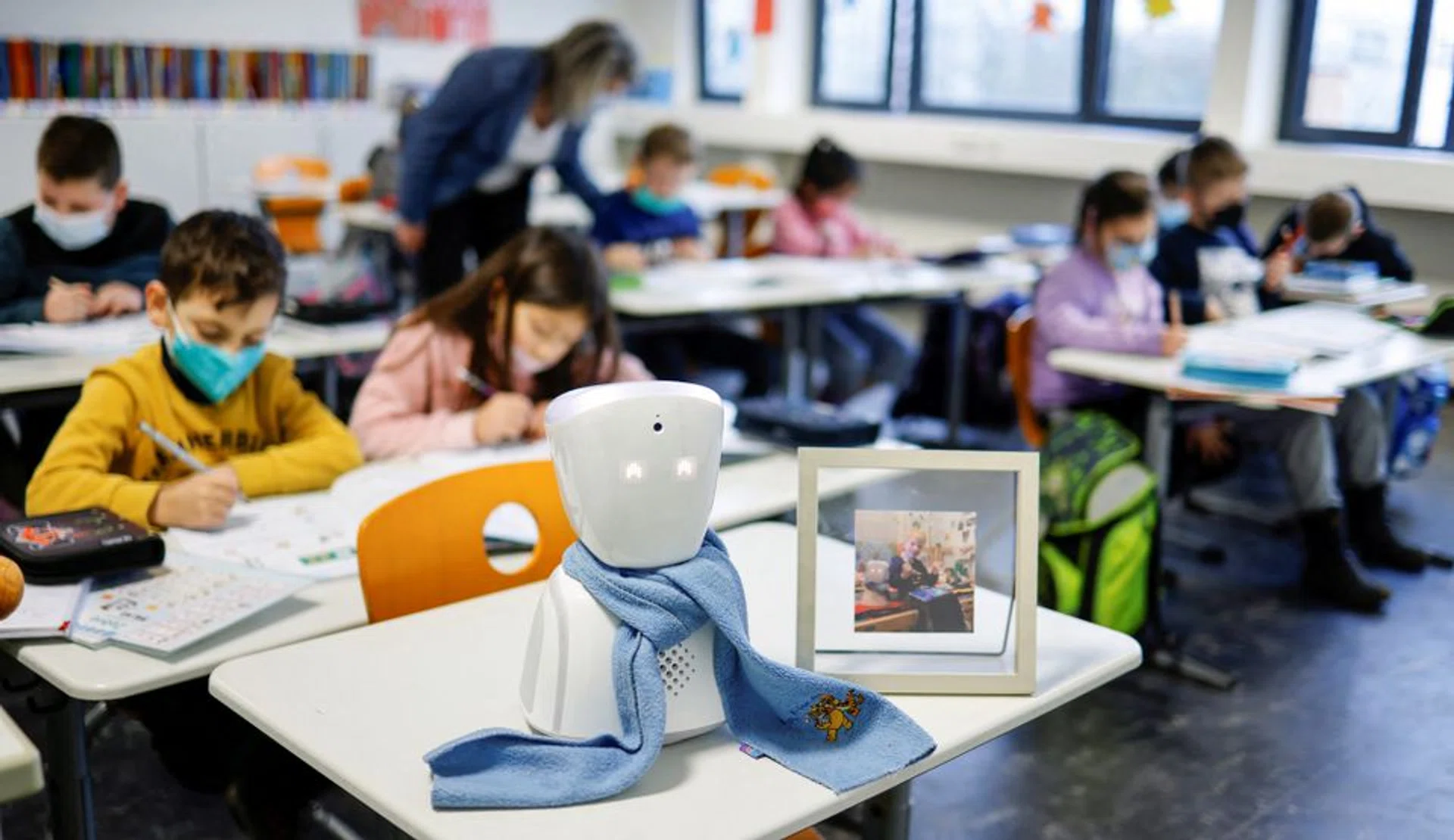 German schoolboy Joshua Martinangeli's robot avatar attending class in Berlin.