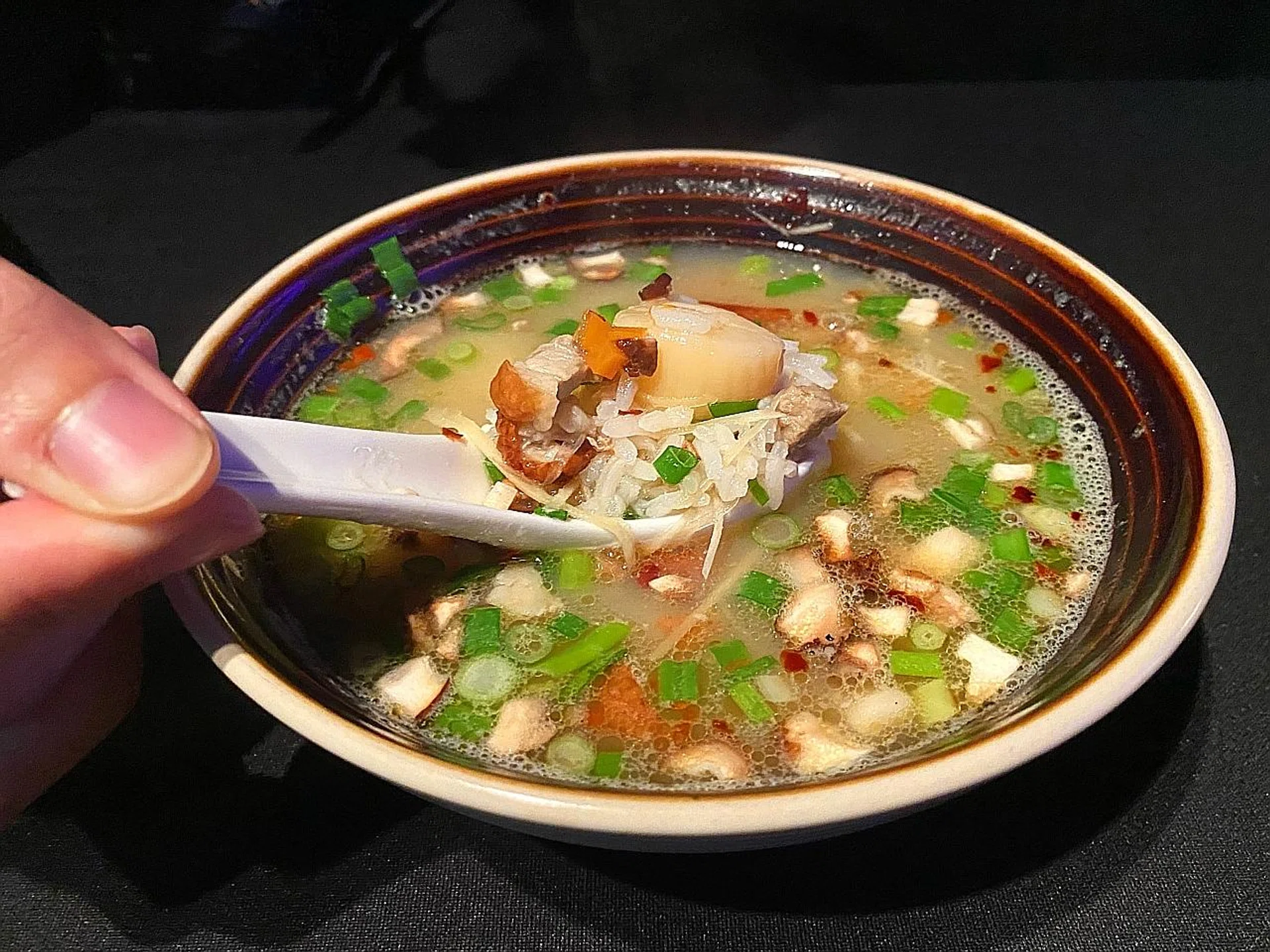 The club's new dining area, called Capital Kitchen, offers a small, eclectic menu featuring  the Signature Royal Broth Congee (above), Kurobuta Pork Belly, Ebi Chilli Flatbread, Crab Meat Tartare, and Signature Battered Fish & Chips. 