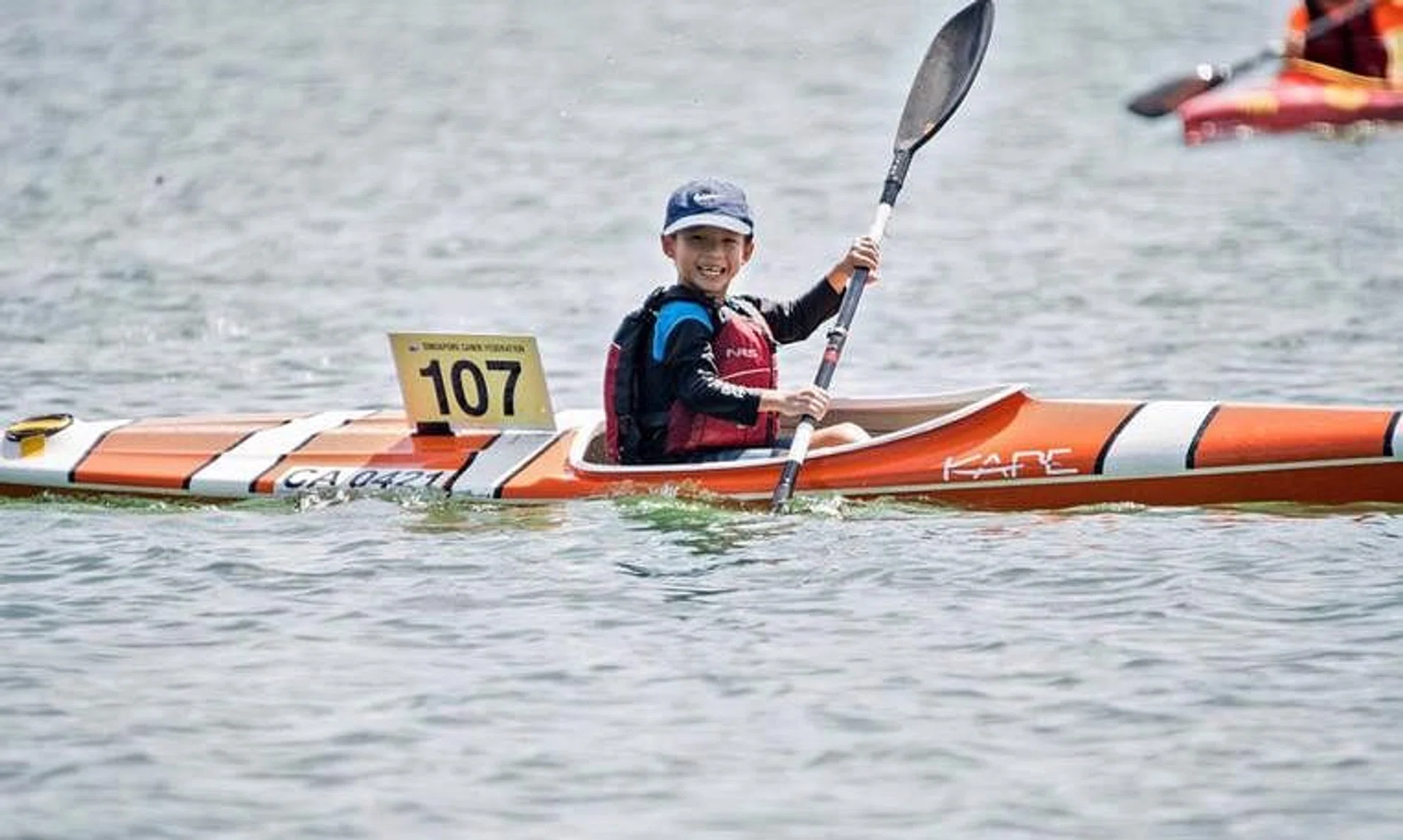 Kids from age 10 can learn to kayak at the Waterfront Carnival organised by PAssion Wave @ Marina Bay.