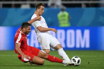 Swiss stun Serbs in comeback win