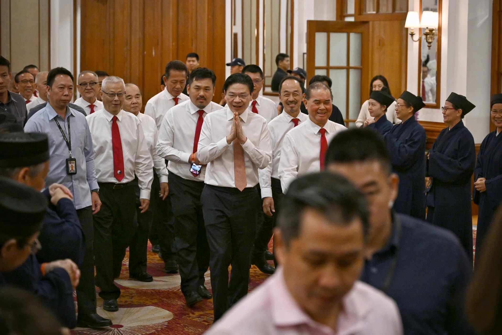PM Lawrence Wong arriving at a dinner to celebrate the Taoist Federation’s 35th anniversary and Singapore’s 60th year of independence.