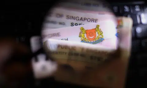 NRIC practices under review at banks, insurers