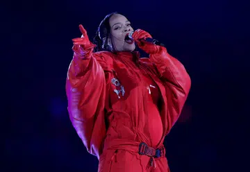 Rihanna reveals baby bump at Super Bowl halftime show