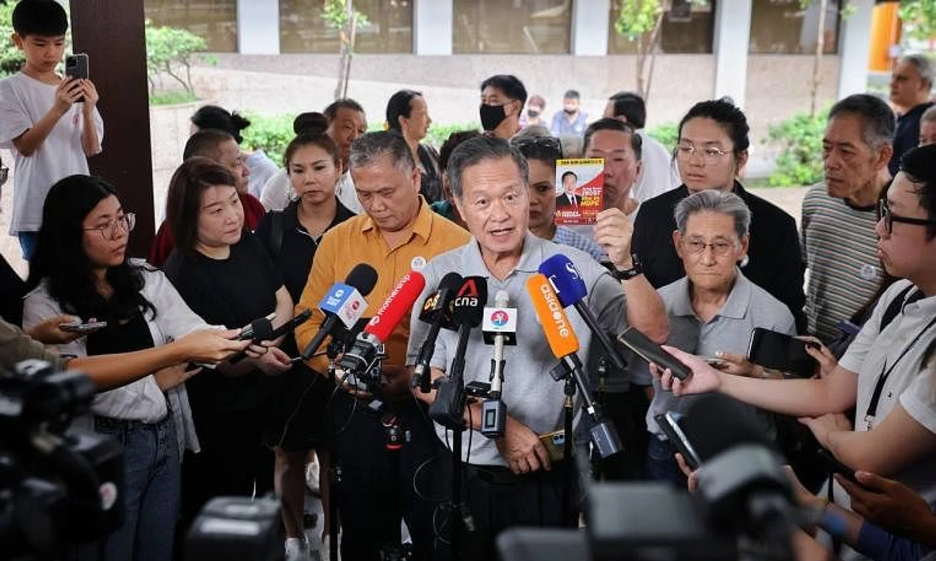Presidential candidate Tan Kin Lian speaking to the media in Hougang Central on Aug 30, 2023.