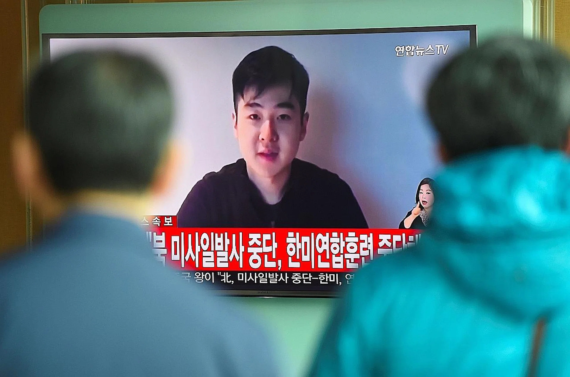 South Koreans watching television news showing video footage of a man who says he is the son of the assassinated Mr Kim Jong Nam. 