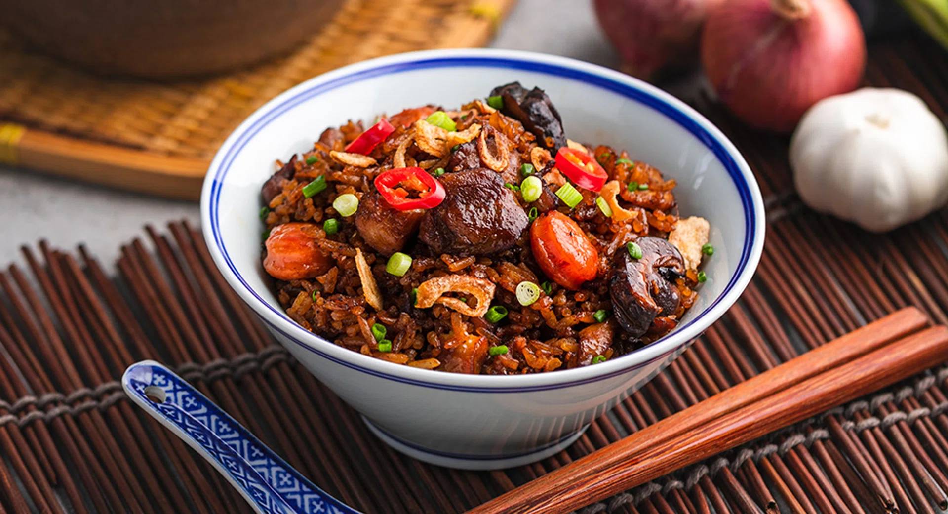 FairPrice's sauces and rice brands are perfect for recreating your favourite claypot rice recipe.
