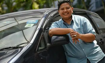 Gojek driver talks distressed passengers out of suicide