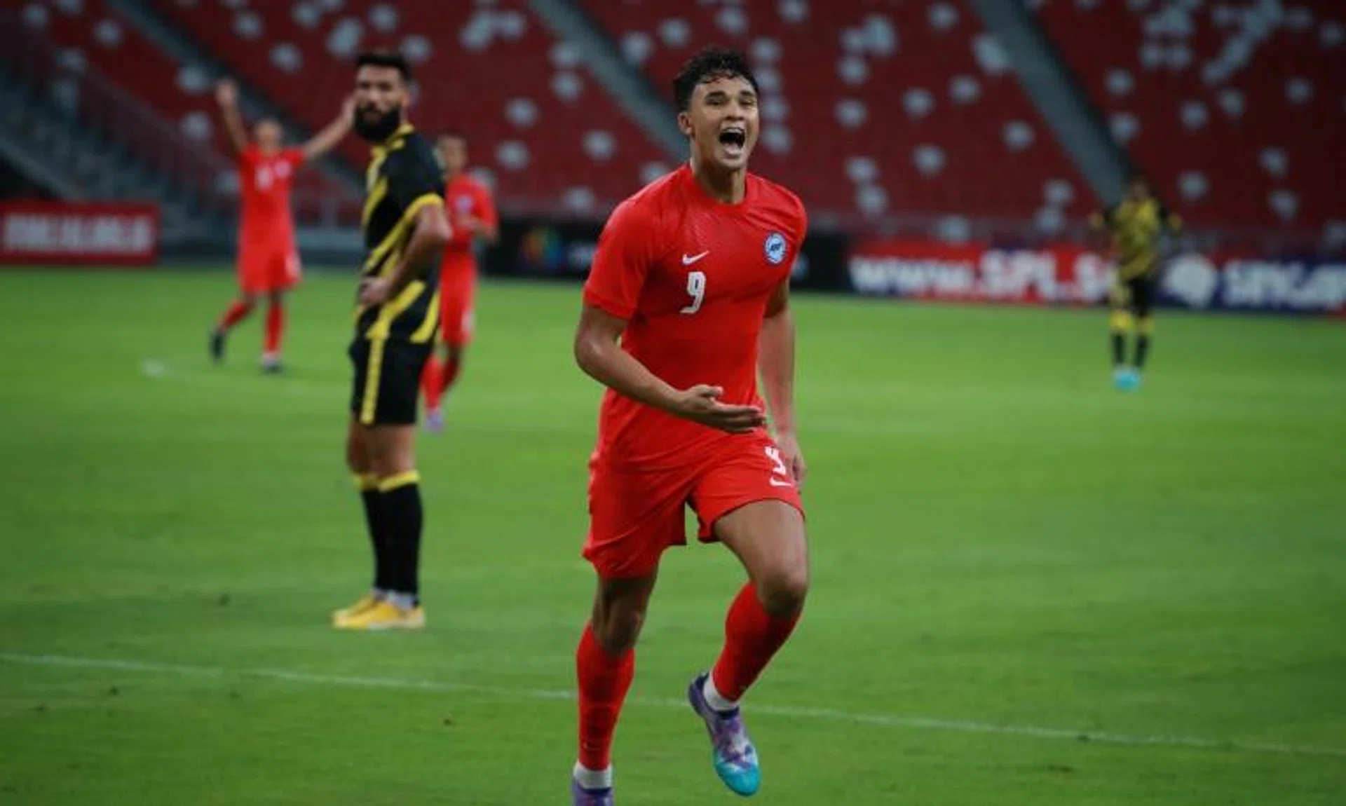 Singapore’s Ikhsan Fandi celebrates after scoring a goal against Malaysia, on March 26, 2022.