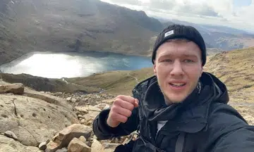 'It's a mental push': Amputee reaches highest mountain in Wales in less than 6 hours