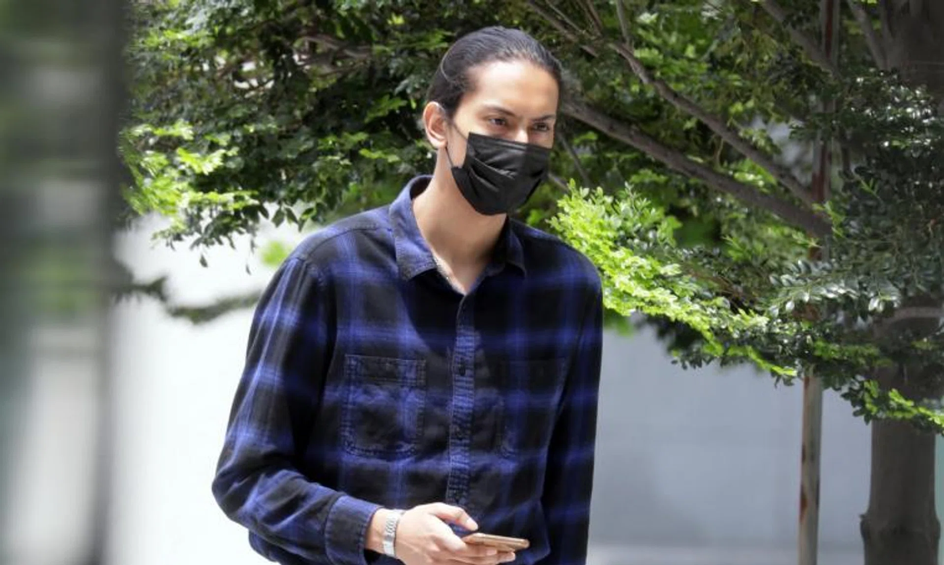 Shae Mika'il Farook got up on a platform and without his mask sang the theme song of SpongeBob SquarePants.