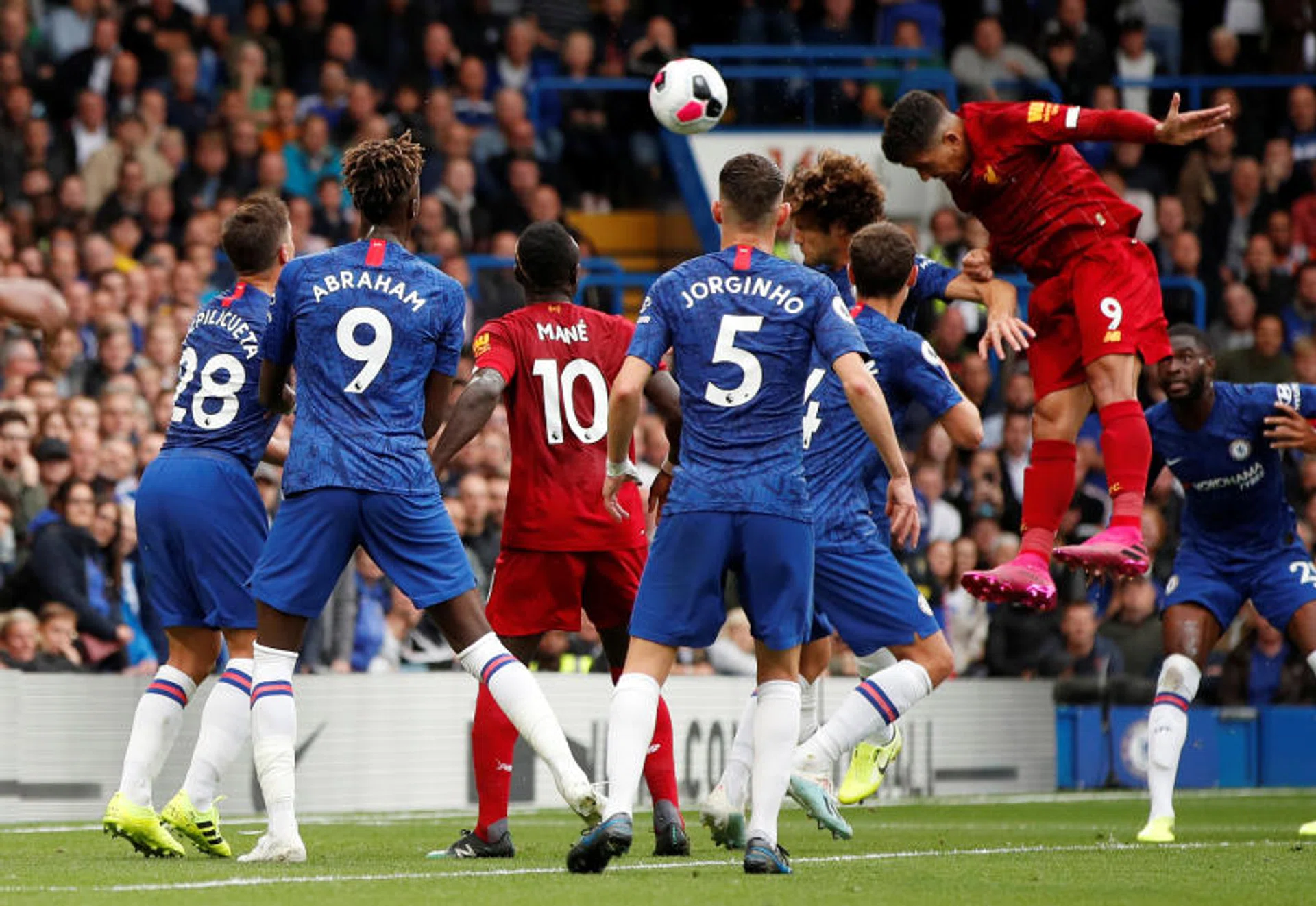 Roberto Firmino heading in Liverpool's second goal.