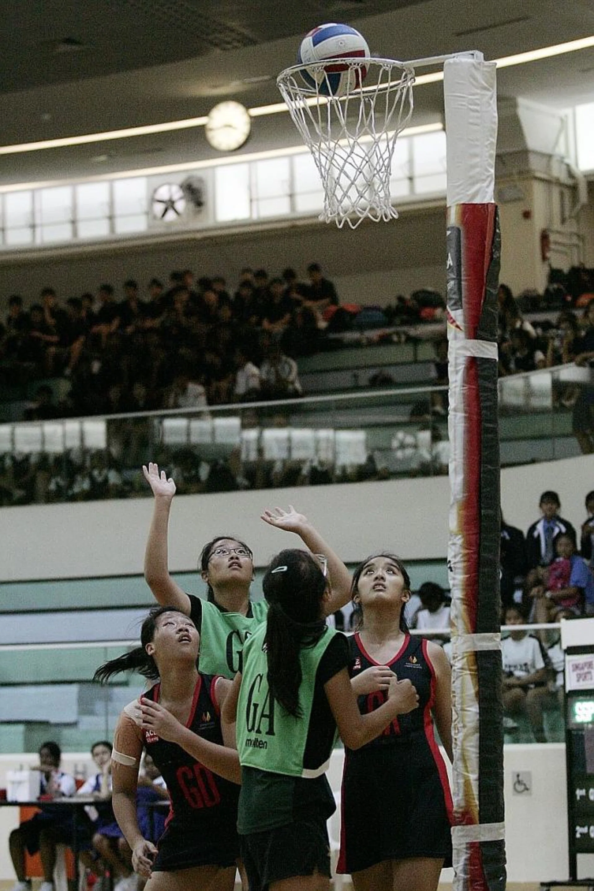 Greenview Secondary School and Singapore Sports School face-off in the Schools National Netball Championship.