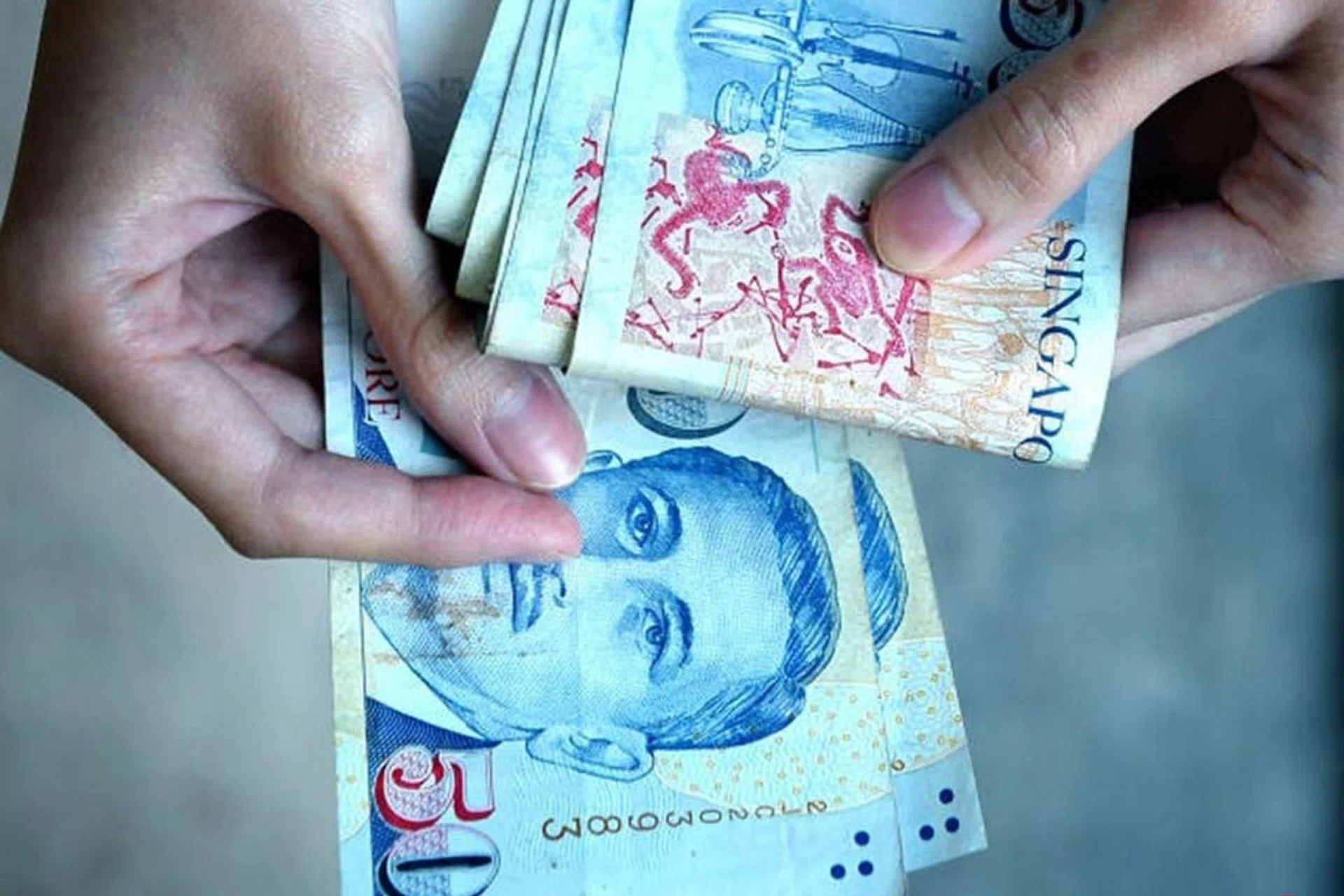 The helper sent some of the money to her husband, keeping the rest for personal expenses.