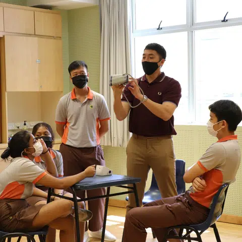 Mr Darryl Lee (third from left) attending a health and nursing module at Bukit View Secondary in 2021 during the school's Applied Learning Week.