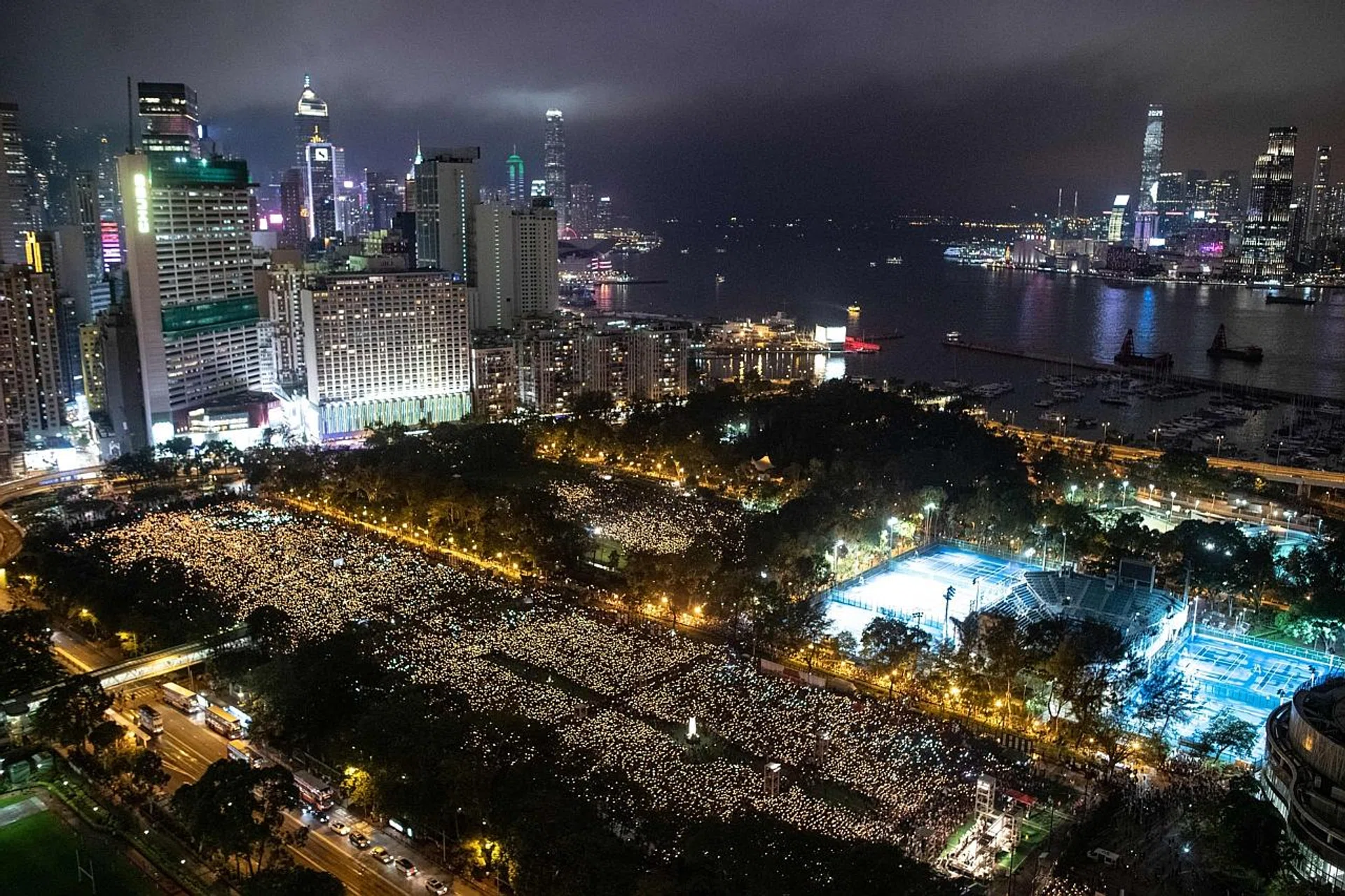 People at a candlelight vigil at Victoria Park in Hong Kong last year to mark the anniversary of the 1989 Tiananmen crackdown in Beijing. 