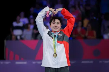 Veteran paddler Feng reclaims singles title in comeback win