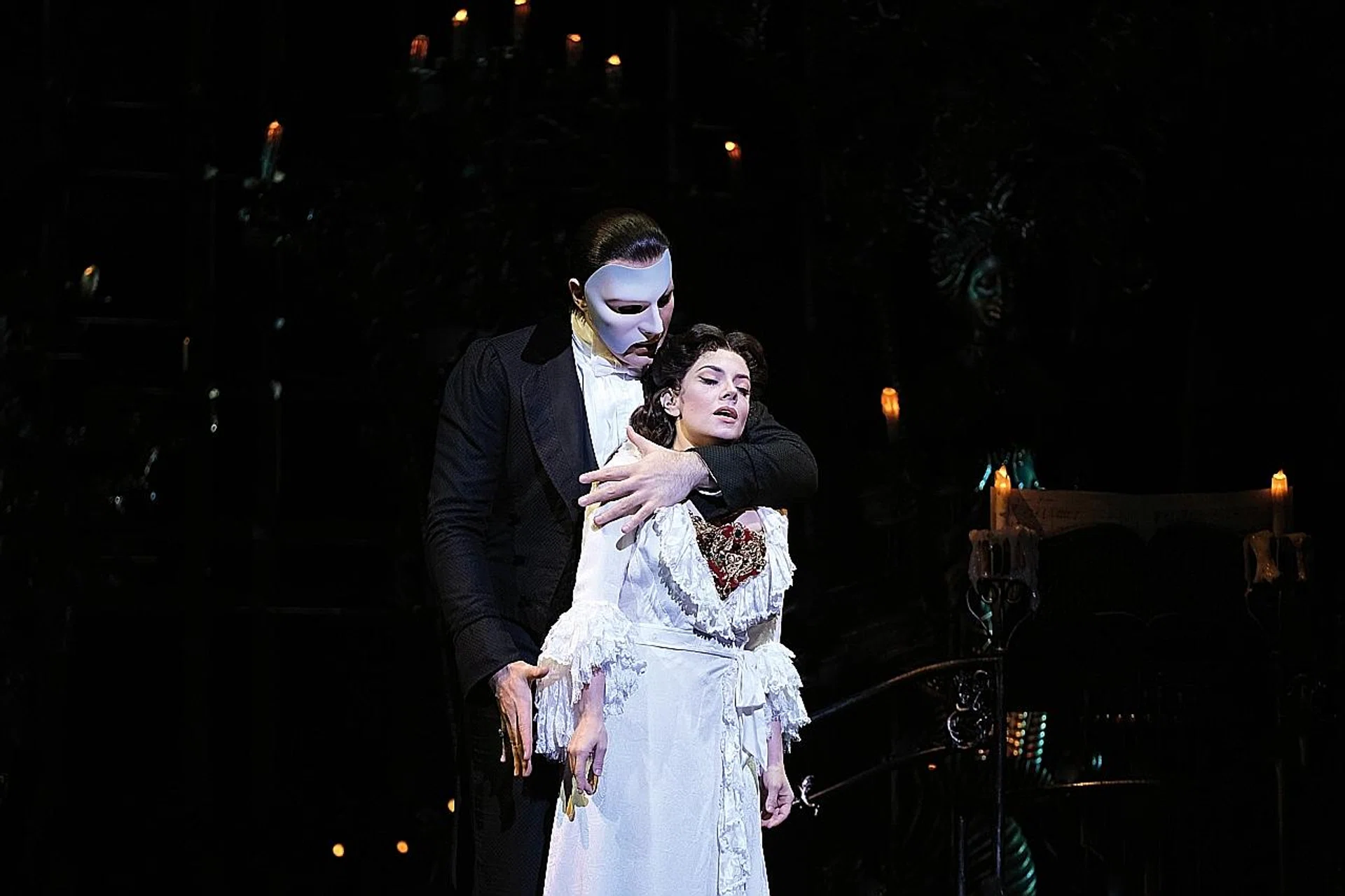 Jonathan Roxmouth (left) as The Phantom and Meghan Picerno as Christine Daaé. 