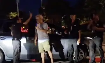 Tempers flare as guards try to stop car from leaving condo