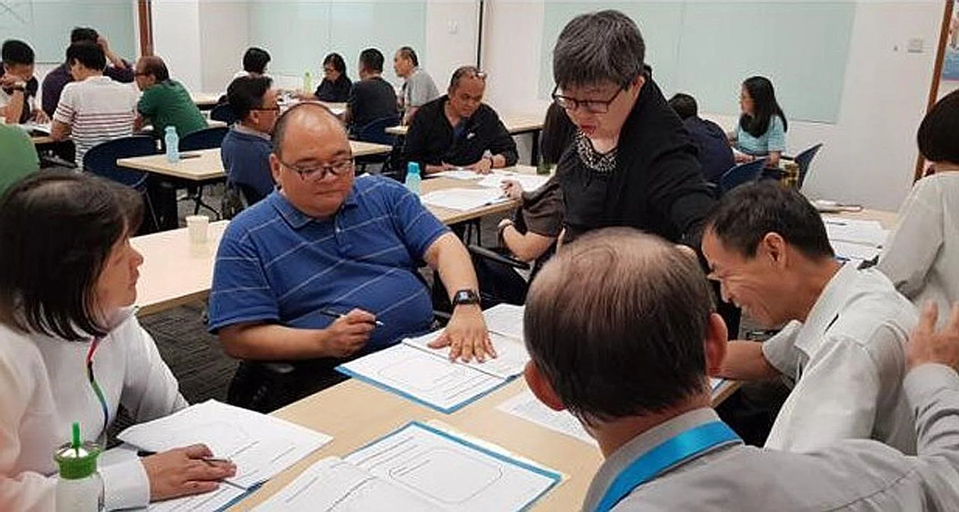 Mature workers attending a course at the Centre For Seniors. 
