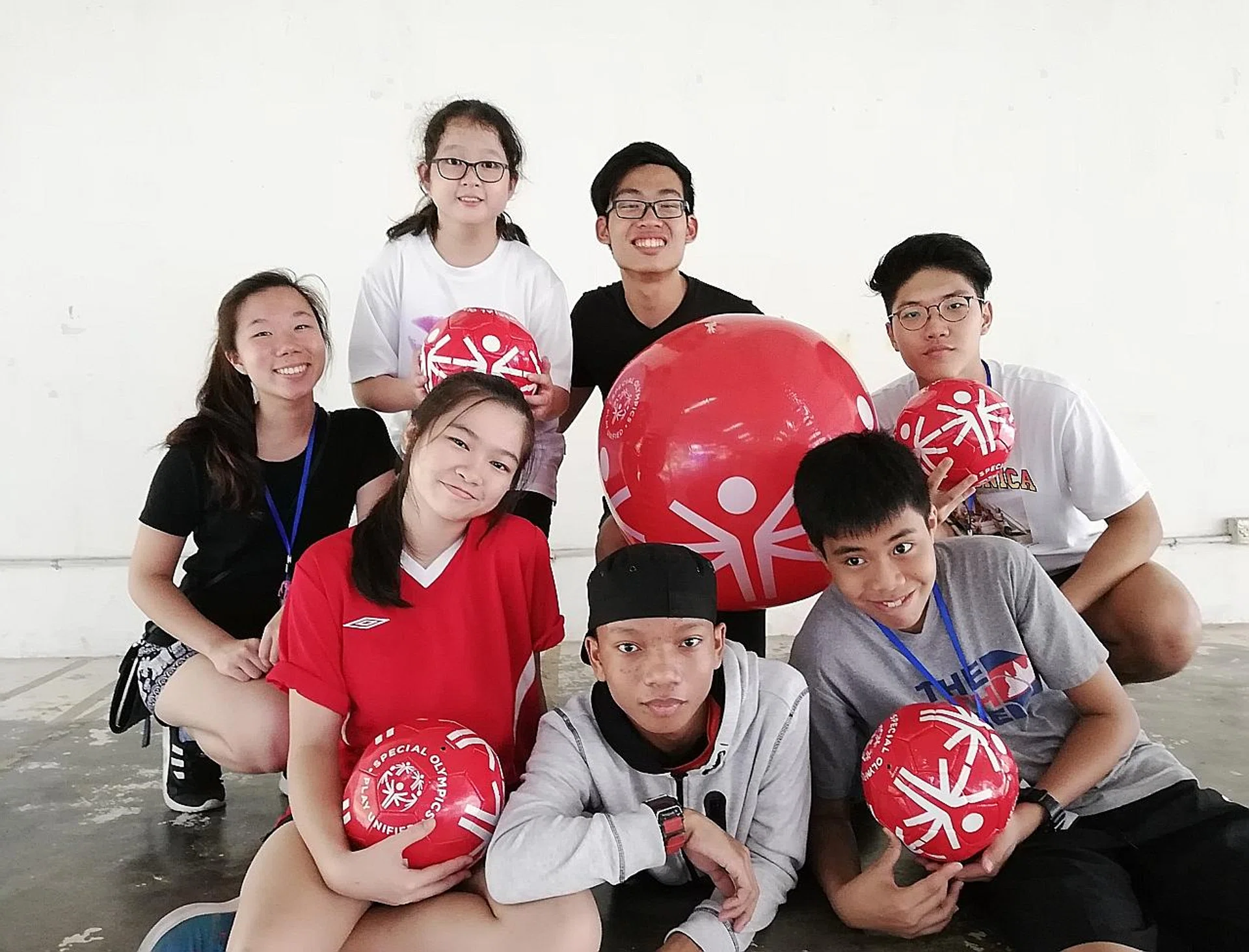 Campers and organisers of Camp Confidante 2018, including Ahmad Nor Imran (in cap) and Iris Yang Yi Ting (in red). 