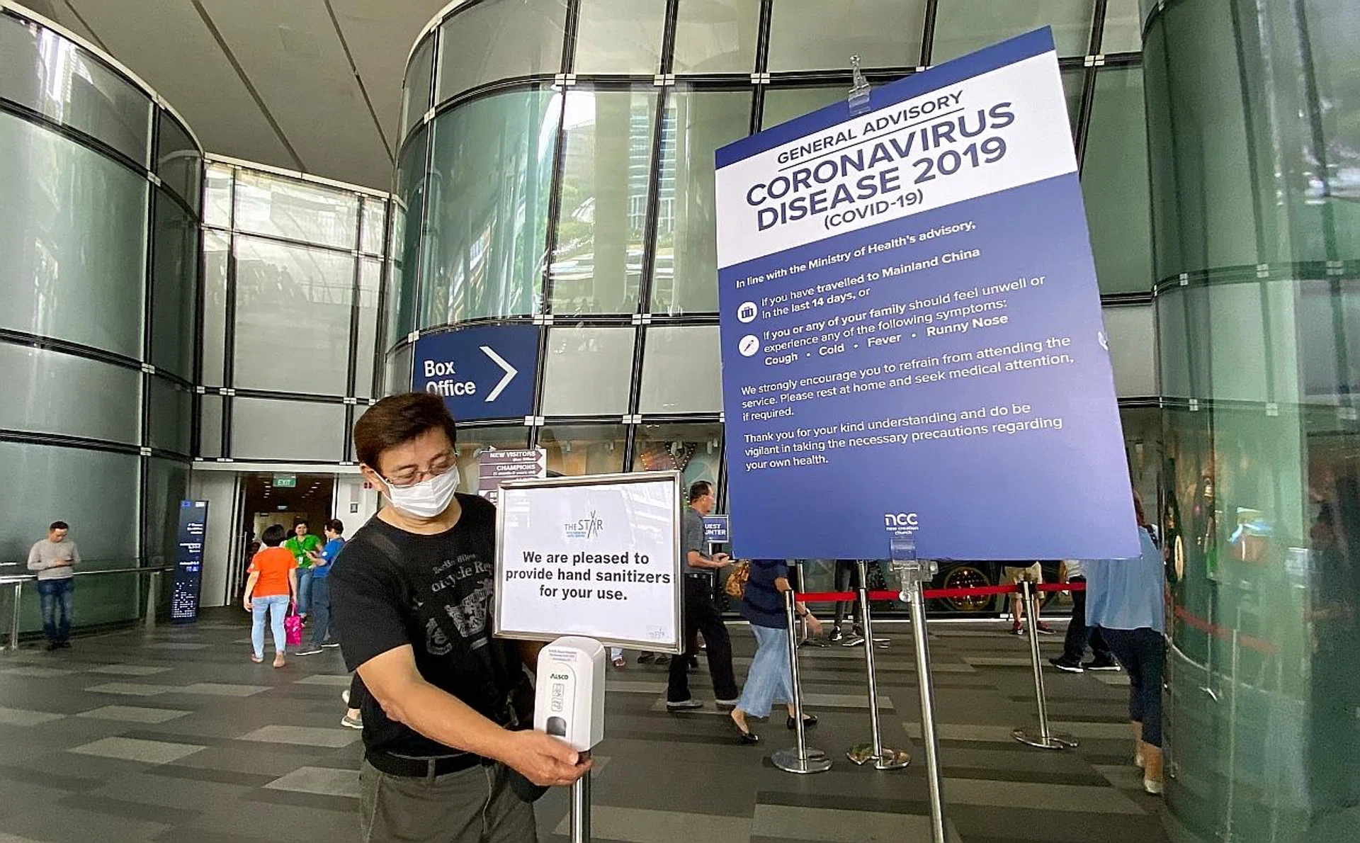 Hand sanitisers are placed at the entrances of The Star Performing Arts Centre in Buona Vista for New Creation Church congregants. 