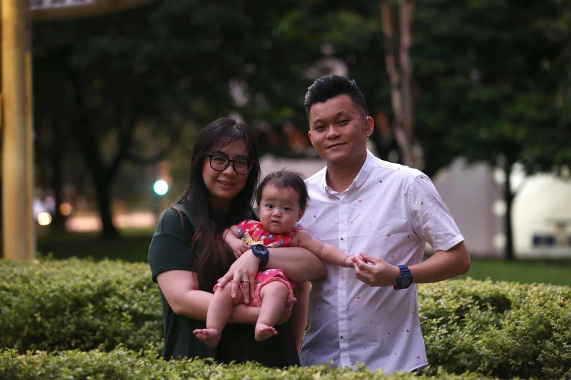 Mrs Pearlin Lee, 38, and Mr Gary Lee, 30, who are both deaf, together with their six-month old daughter, Mirae.