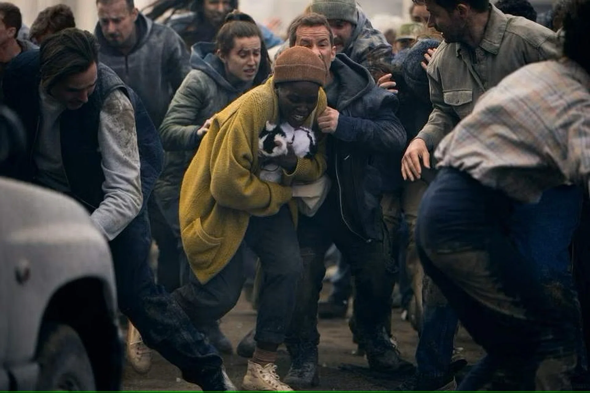Lupita Nyong’o with her feline co-star in A Quiet Place: Day One. 