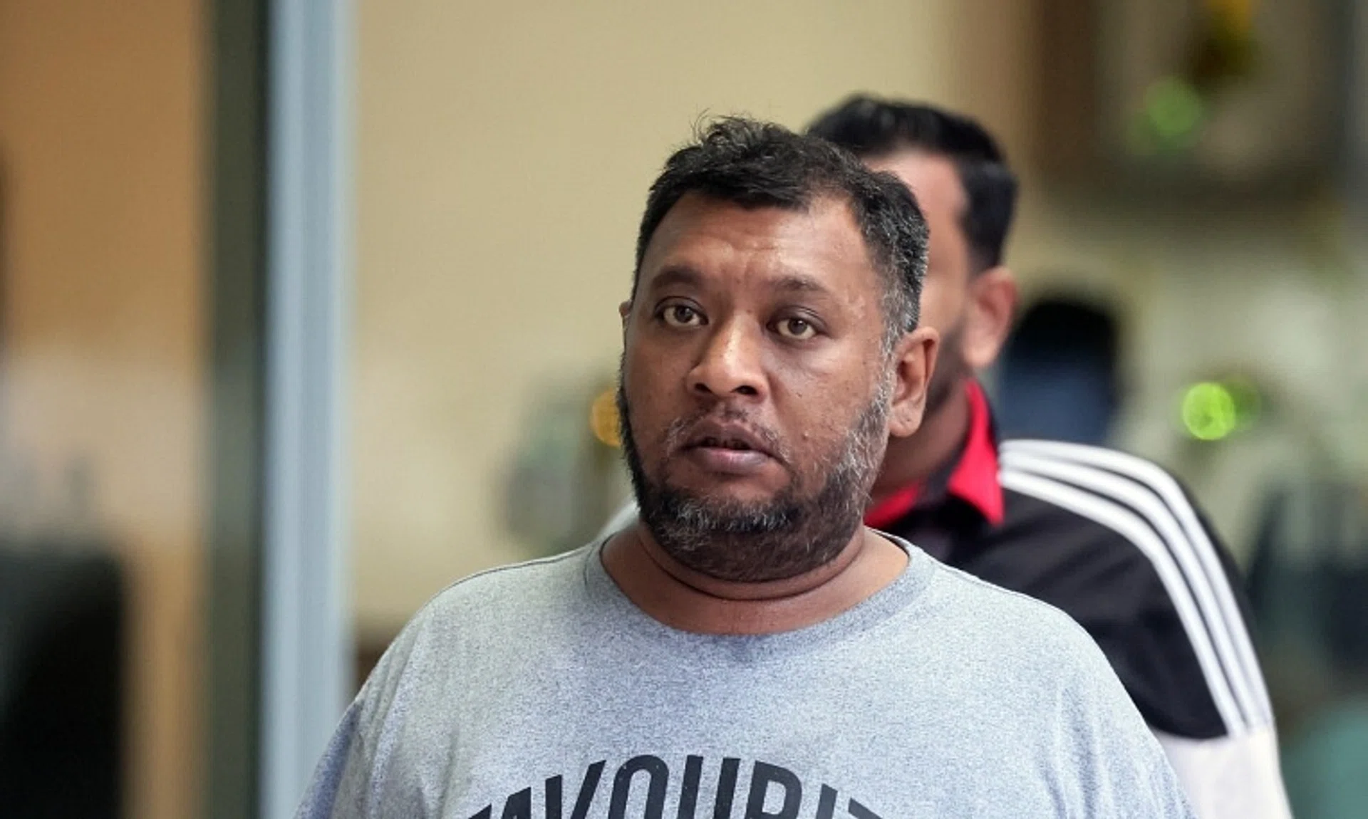 Durendran Vicknesh Venkatraman arriving at the State Courts in April 9.